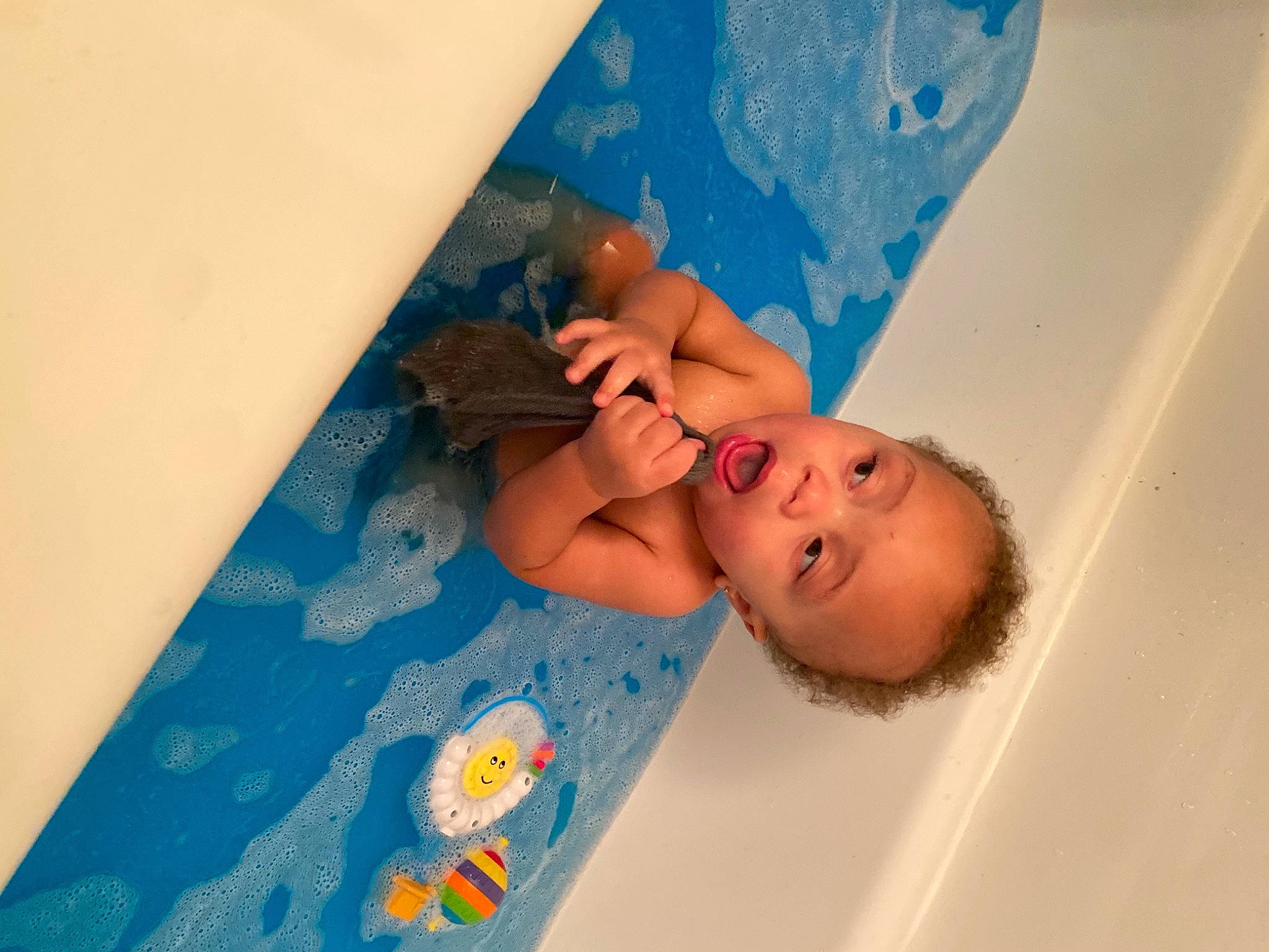 Amarion joined the competition — help win amazing prizes! aqua, azure, baby, baby_bathing, baby_products, barechested, bathing, bathroom, bathtub, blue, chest, fluid, foam, person, surprise, throat
