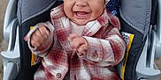 Sylas joined the competition — help win amazing prizes! baby, smiling, plaid_jacket, white_hat, car_seat, child, happy, clapping_hands, cute, infant, outdoor, clothing, seat, portrait, joy, warm, babywear, kid, person, expression