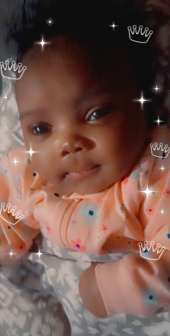 Brianna is registered to the contest to win money with this photo: baby, baby_toddler_clothing, cheek, chest, child, eyebrow, eyelash, flash_photography, flesh, fun, happy, iris, lip, mouth, nose, person, portrait_photography, skin, smile, sweetness