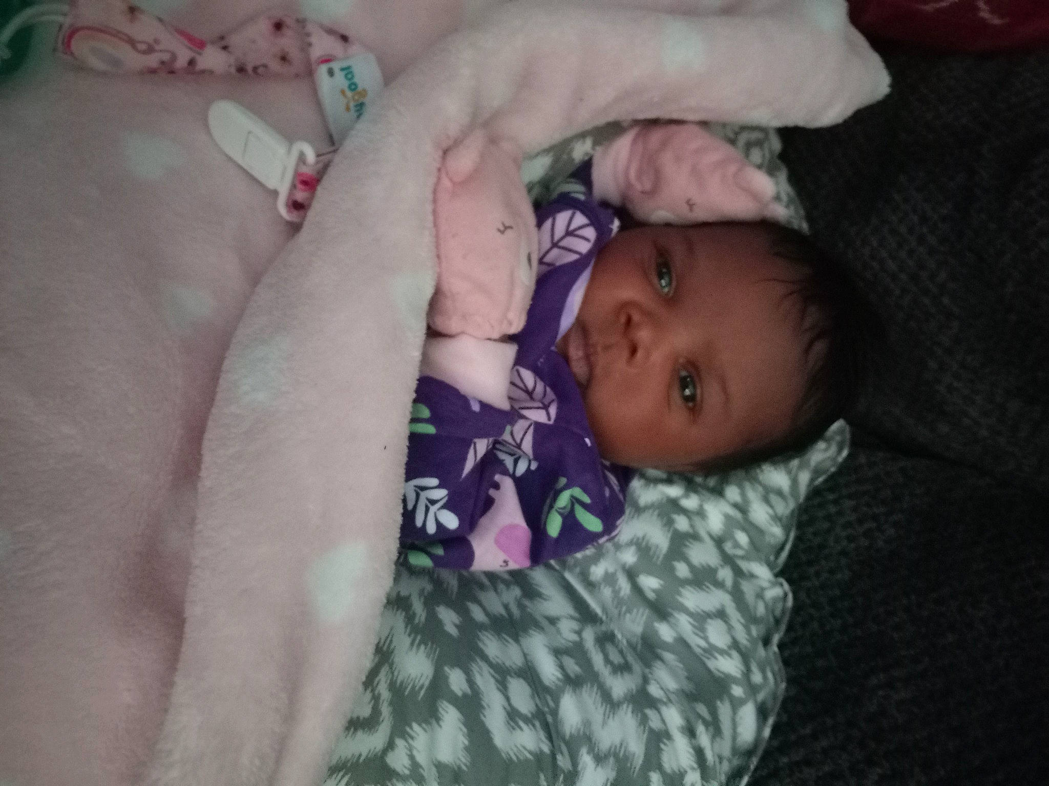 Brianna joined the competition — help win amazing prizes! baby, baby_toddler_clothing, cheek, child, comfort, eyelash, finger, fun, iris, linens, lip, mouth, nail, nose, pattern, person, room, sitting, skin, thumb