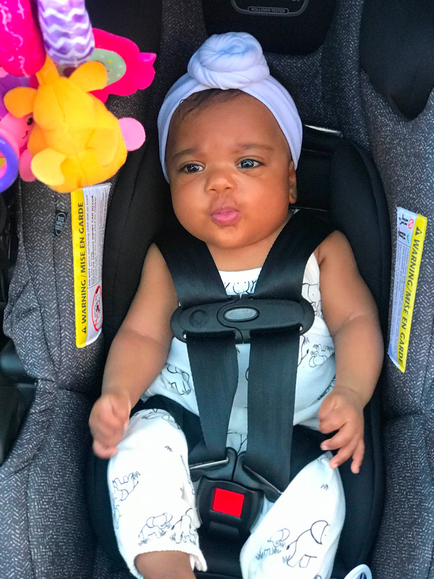 Ayana joined the competition — help win amazing prizes! baby_carriage, baby_products, cap, car_seat, child, cool, day, fashion_accessory, headgear, person, product, toddler