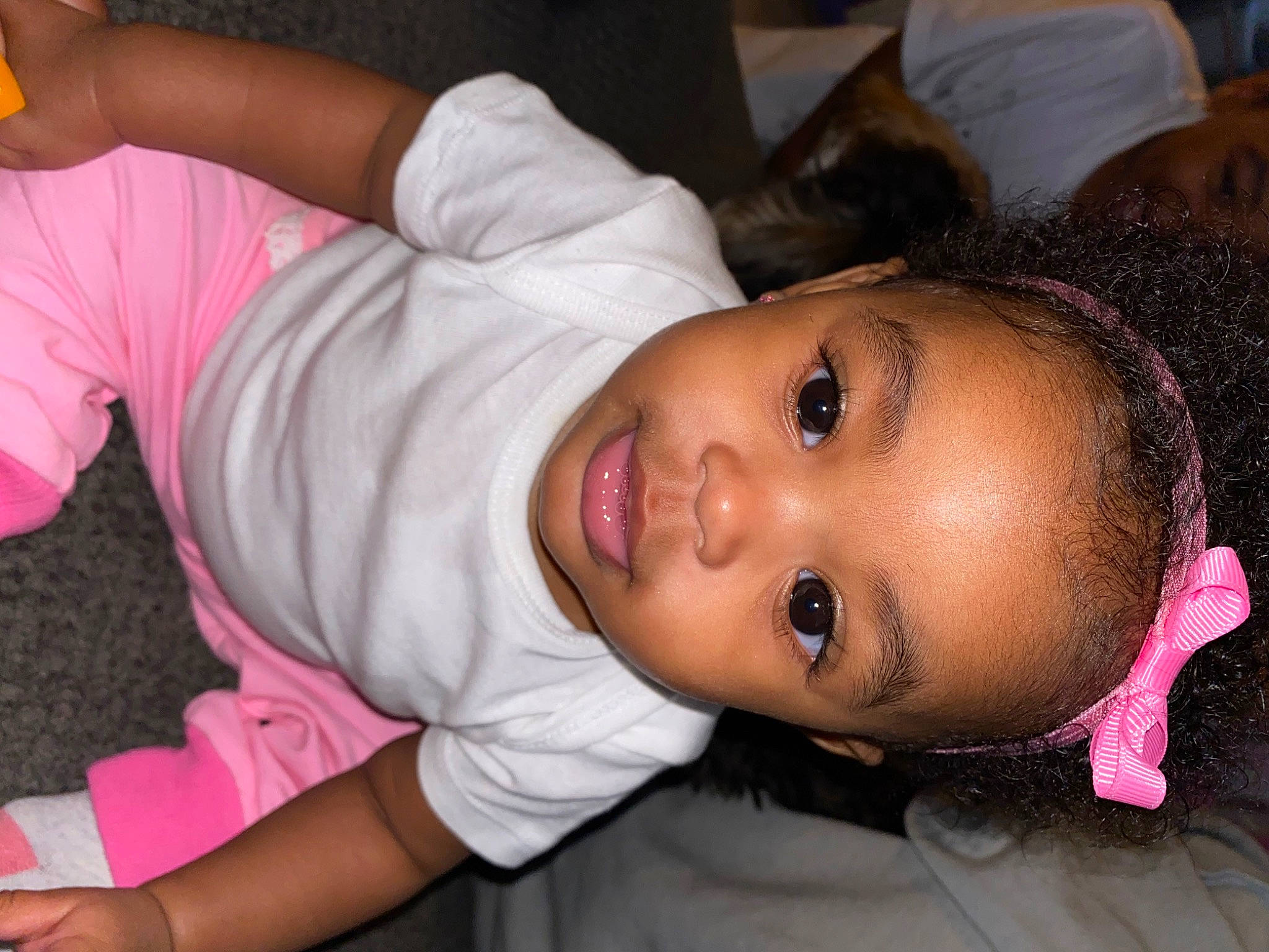 Farrah is registered to the contest to win money with this photo: baby_toddler_clothing, black_hair, cheek, child, comfort, ear, eye, eyelash, face, forehead, fun, happy, lip, mouth, neck, nose, person, skin, sleeve, smile