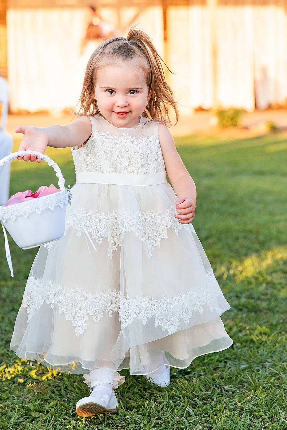 Dovey is registered to the contest to win money with this photo: a_line, baby, bridal_party_dress, ceremony, child, child_model, clothing, dress, formal_wear, gown, grass, joy, person, photograph, photography, ritual, ruffle, toddler, wedding, wedding_ceremony_supply