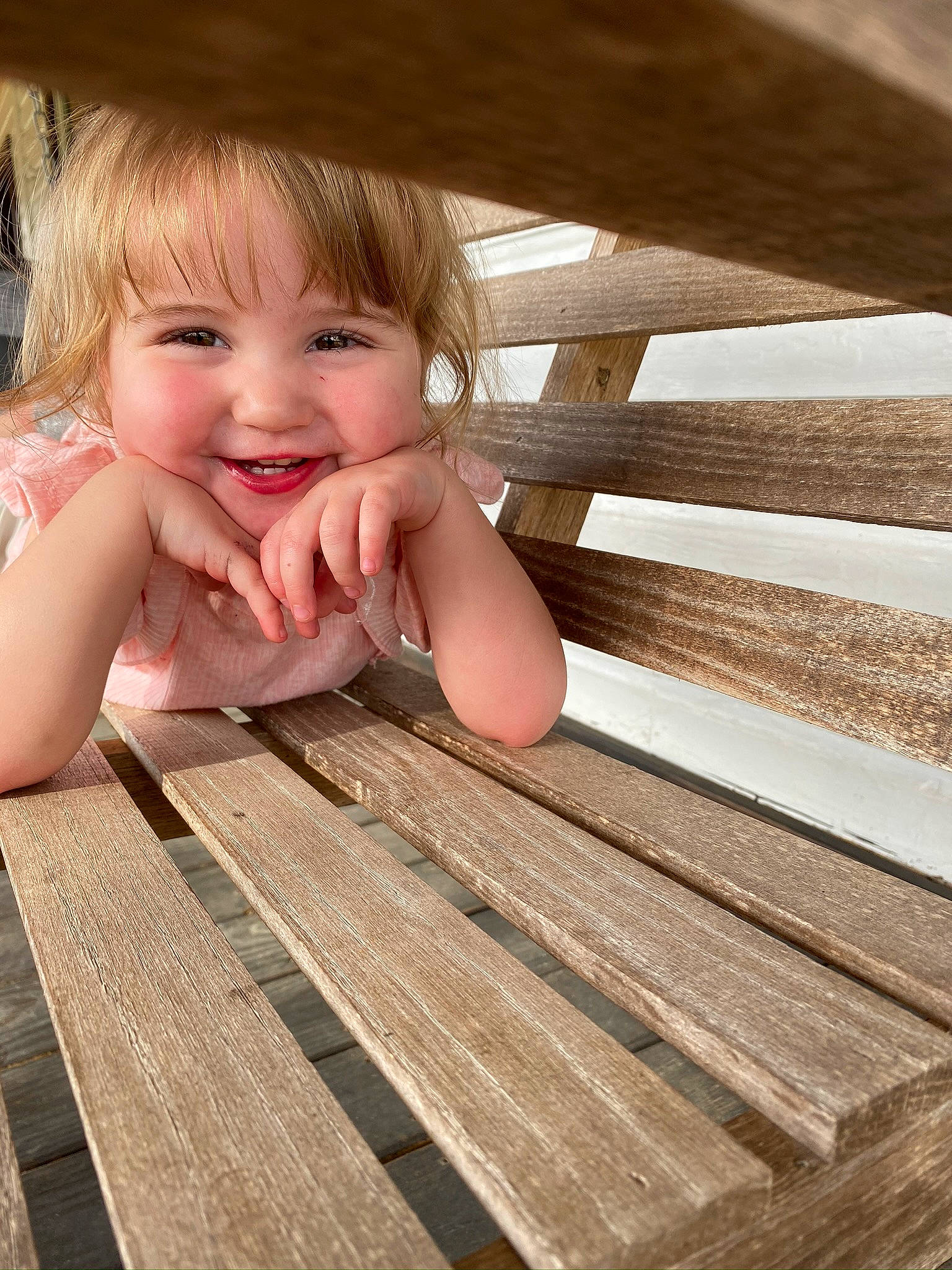 Dovey joined the competition — help win amazing prizes! baby, blond, child, deck, eye, face, finger, hand, hardwood, joy, nose, person, skin, smile, toddler, wood, wood_stain