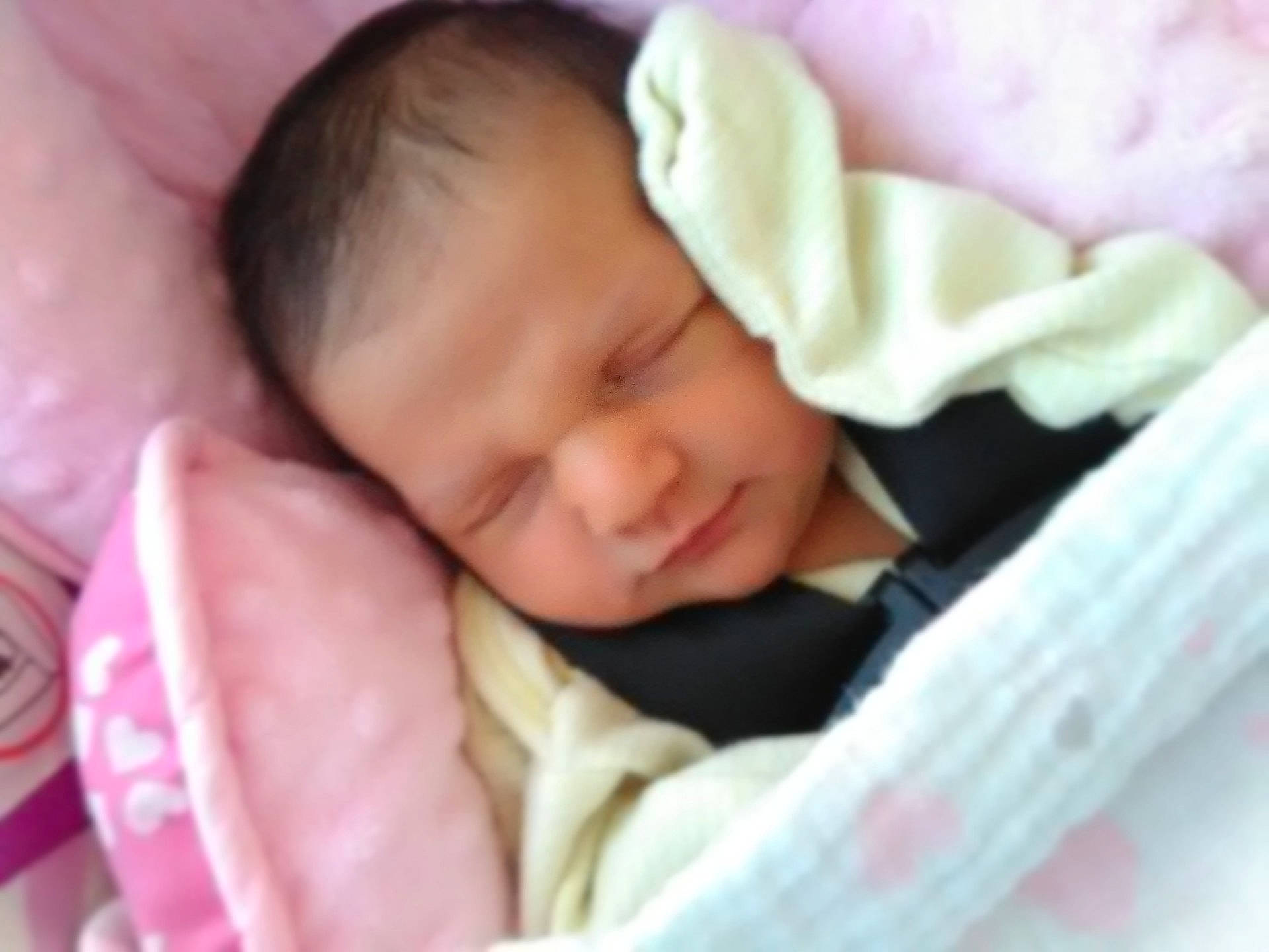 Italy is registered to the contest to win money with this photo: baby_products, beauty, bed, bedtime, cheek, child, close_up, day, eye, face, facial_expression, head, infant, nose, pink, product, skin, sleep, smile, toddler