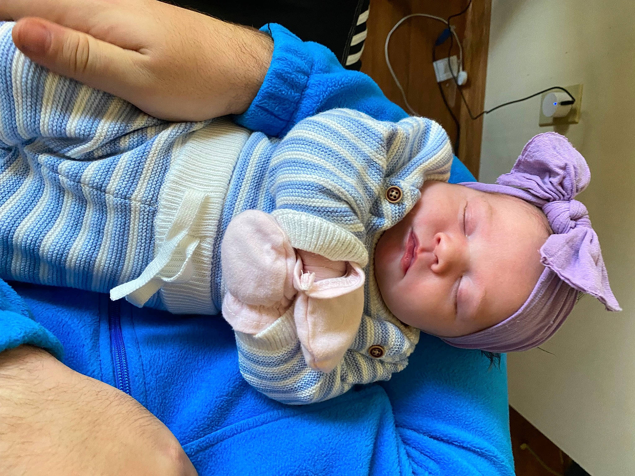 Gracelyn is registered to the contest to win money with this photo: arm, baby, baby_toddler_clothing, comfort, electric_blue, eye, finger, gesture, hand, happy, hat, joint, mouth, nail, people, person, skin, smile, thumb, toddler