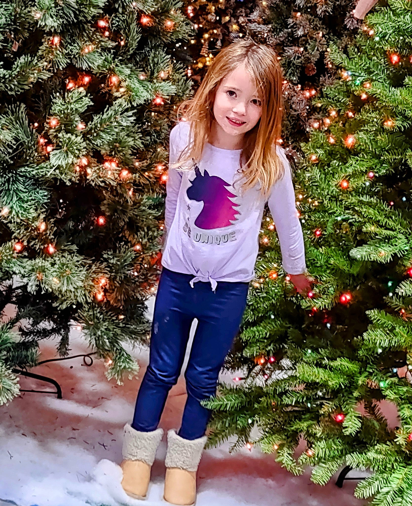 Avah joined the competition — help win amazing prizes! branch, christmas_ornament, christmas_tree, facial_expression, hair, hairstyle, happy, head, human_body, jeans, joy, light, nature, outerwear, people_in_nature, person, photograph, plant, sleeve, standing