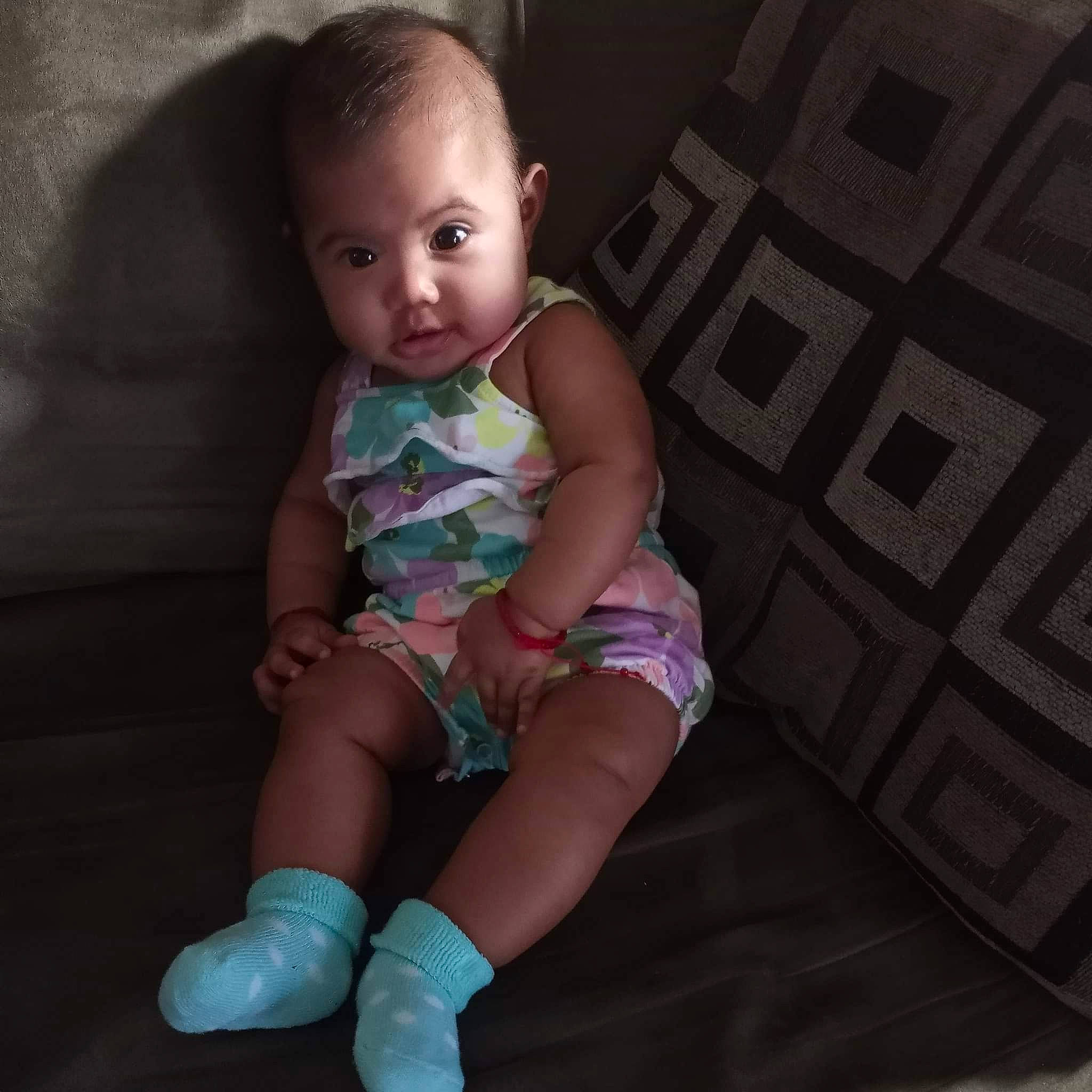 Leah is registered to the contest to win money with this photo: baby_toddler_clothing, comfort, eye, face, facial_expression, finger, flash_photography, floor, hairstyle, head, iris, joint, knee, mouth, person, pink, shoulder, skin, smile, thigh