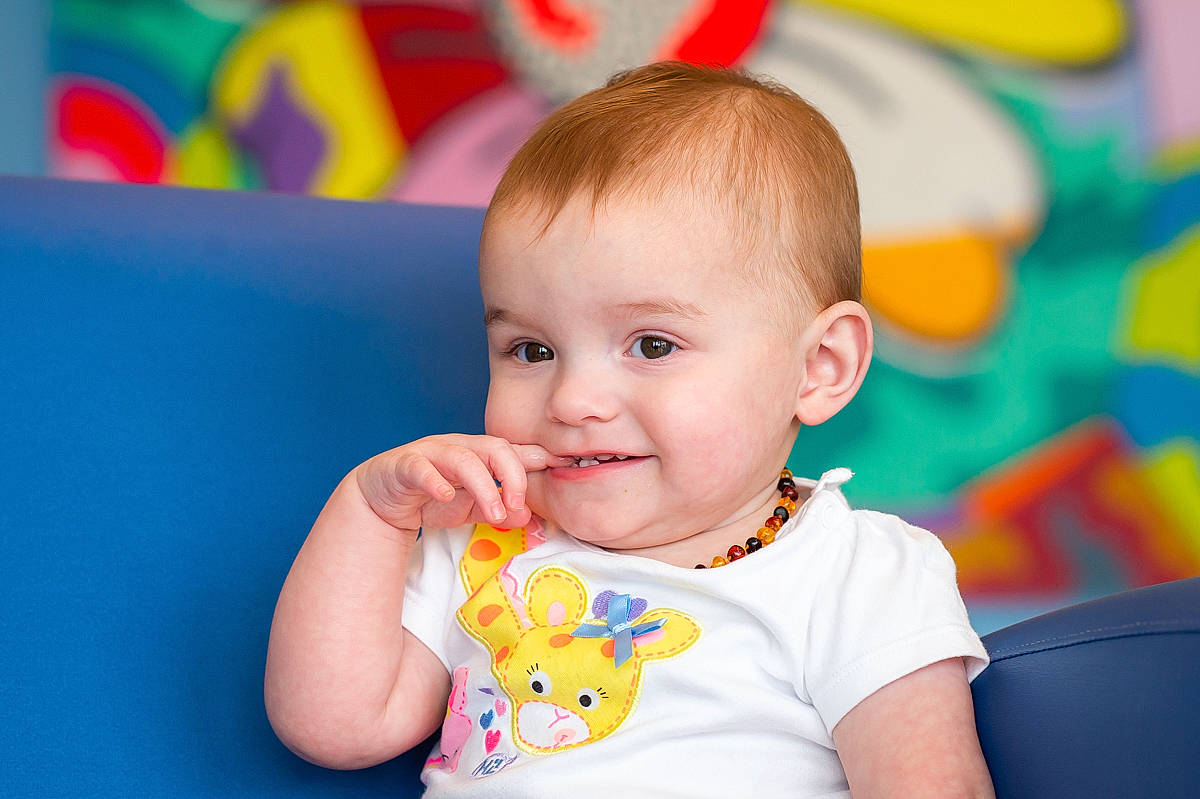 Kayla joined the competition — help win amazing prizes! baby, baby_playing_with_toys, baby_toddler_clothing, cheek, chin, dress, eye, fun, hairstyle, happy, head, iris, joy, nose, orange, person, product, skin, sleeve, smile