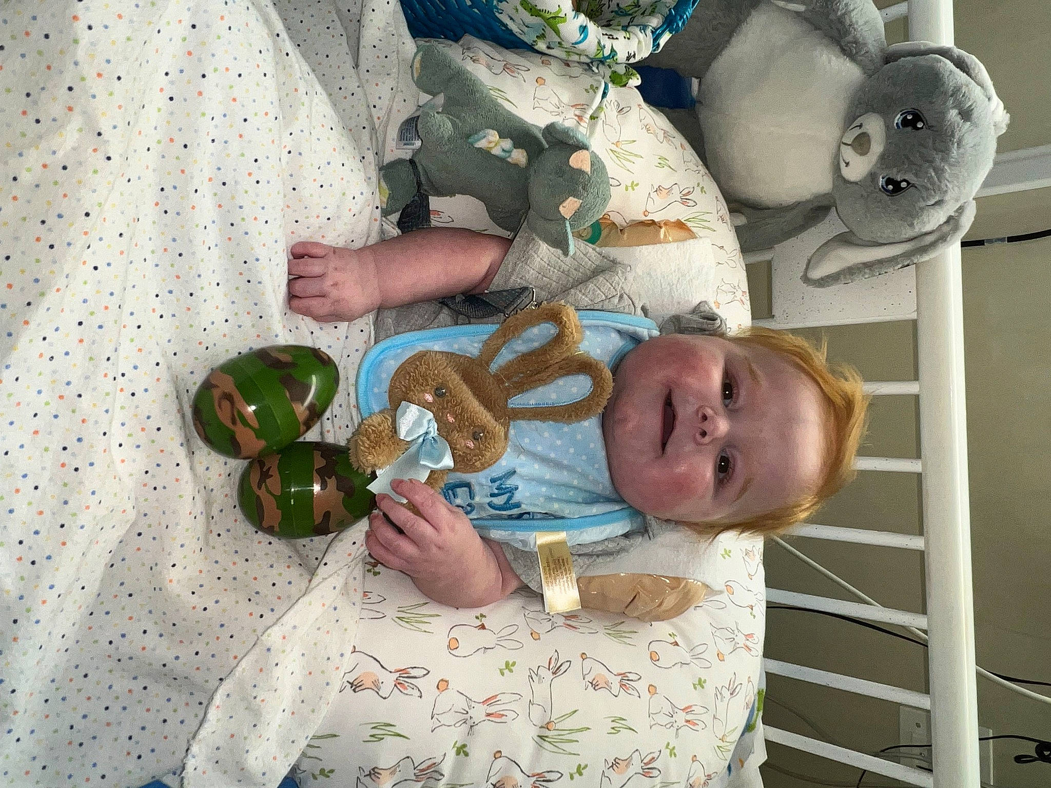 Steve is registered to the contest to win money with this photo: baby, baby_products, baby_toddler_clothing, child, comfort, eye, food, head, human_body, mouth, pattern, person, room, sitting, smile, textile, toddler, white