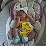 Skylar joined the competition — help win amazing prizes! baby, infant, sleeping, yellow_dress, headband, bunny_ears, baby_seat, plush_toy, cushion, patterned_fabric, mint_socks, indoor, cozy, peaceful, child, newborn, cute, soft_toys, resting, portrait