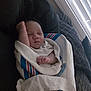Skylar joined the competition — help win amazing prizes! baby, blanket, sleeping, cushion, indoor, child, resting, peaceful, face, hand, window, light, striped_blanket, cozy, infant, furniture, portrait, relaxing, soft_light, wrapped