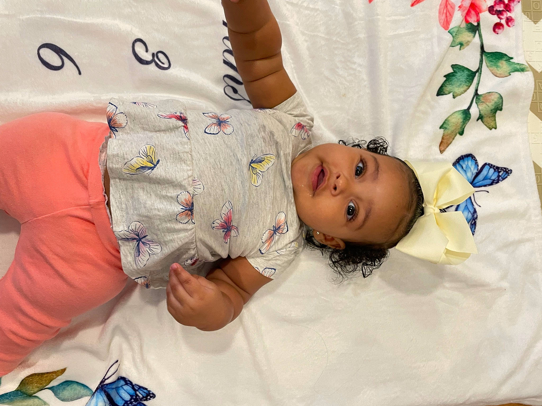 Amiyah is registered to the contest to win money with this photo: arm, baby, baby_sleeping, baby_toddler_clothing, bedding, child, comfort, eyelash, happy, hat, human, linens, people, person, room, skin, sleeve, t_shirt, textile, toddler