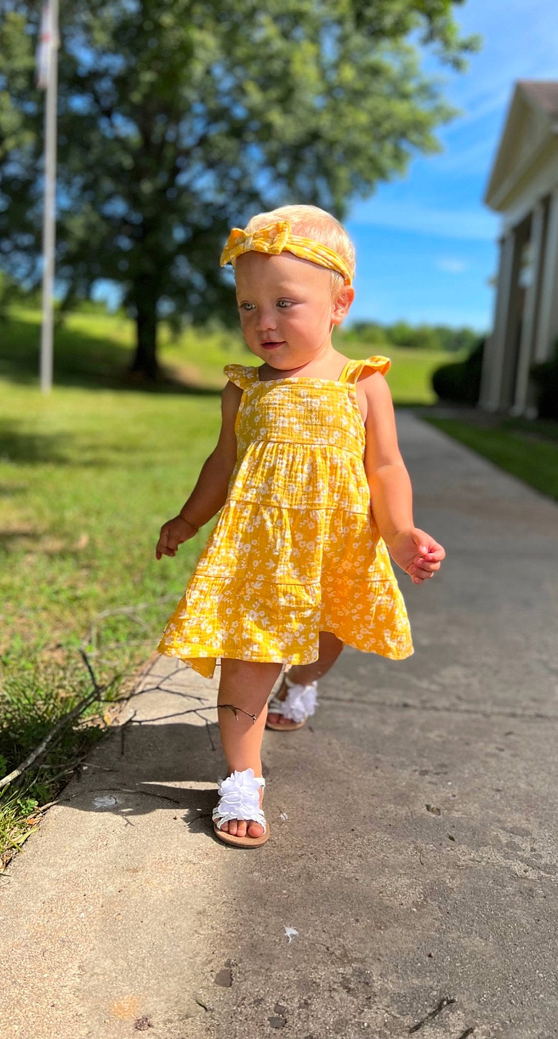 Emberlynn joined the competition — help win amazing prizes! asphalt, baby, baby_toddler_clothing, child, day_dress, dress, face, fun, grass, happy, leisure, magenta, pattern, people_in_nature, person, plant, recreation, sky, toddler, tree