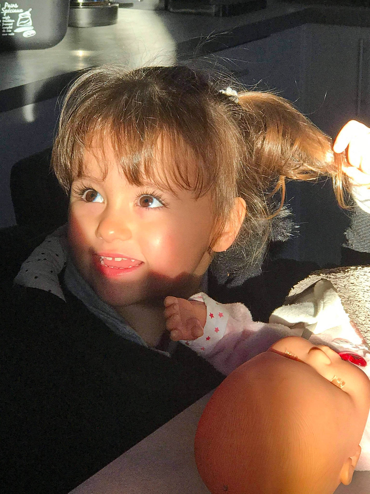 Aliyah participe au concours pour gagner de l'argent avec cette photo : black_hair, blond, cheek, chest, child, eyelash, flash_photography, fun, gesture, human_leg, iris, lip, long_hair, mouth, nail, nose, person, skin, thigh, toddler