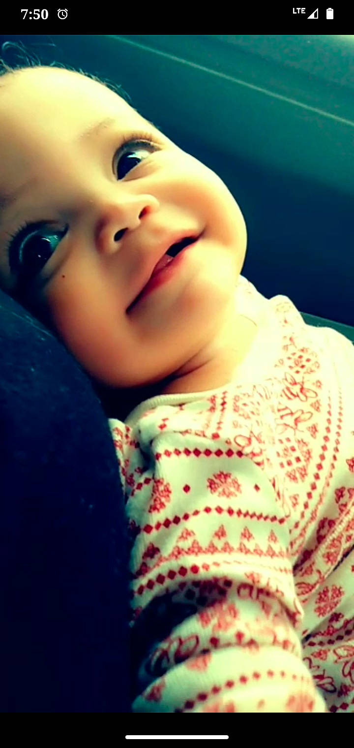 Karissa is registered to the contest to win money with this photo: cheek, chin, eye, eyebrow, eyelash, forehead, human, human_body, jaw, lip, mouth, neck, nose, organ, outerwear, person, plant, skin, sleeve, smile