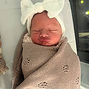 Gweni joined the competition — help win amazing prizes! newborn, baby, sleeping, blanket, headband, bow, cozy, knitted, infant, wrapped, peaceful, cute, soft, indoors, portrait, child, sleep, babywear, rest, small