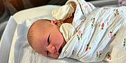 Kinleigh is registered to the contest to win money with this photo: baby, bed, blanket, child, cute, face, floral_pattern, fresh, head, hospital, infant, newborn, portrait, resting, sleeping, small, soft, swaddled, white, wrapped