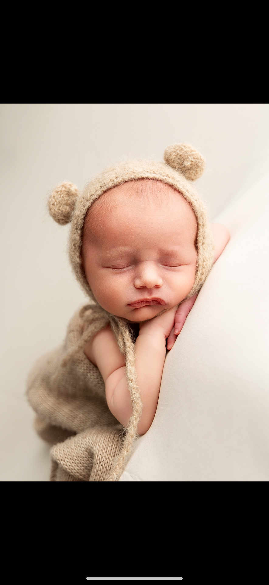 Carter-Blu joined the competition — help win amazing prizes! baby, newborn, sleeping, knitted_hat, bear_ears, blanket, soft_texture, neutral_colors, closeup, peaceful, infant, cute, child, portrait, resting, cozy, warm, hands, face, skin