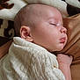 Declan is registered to the contest to win money with this photo: baby, sleeping, blanket, closeup, face, infant, peaceful, rest, skin, head, ear, hand, soft, texture, cozy, portrait, indoors, newborn, child, cute