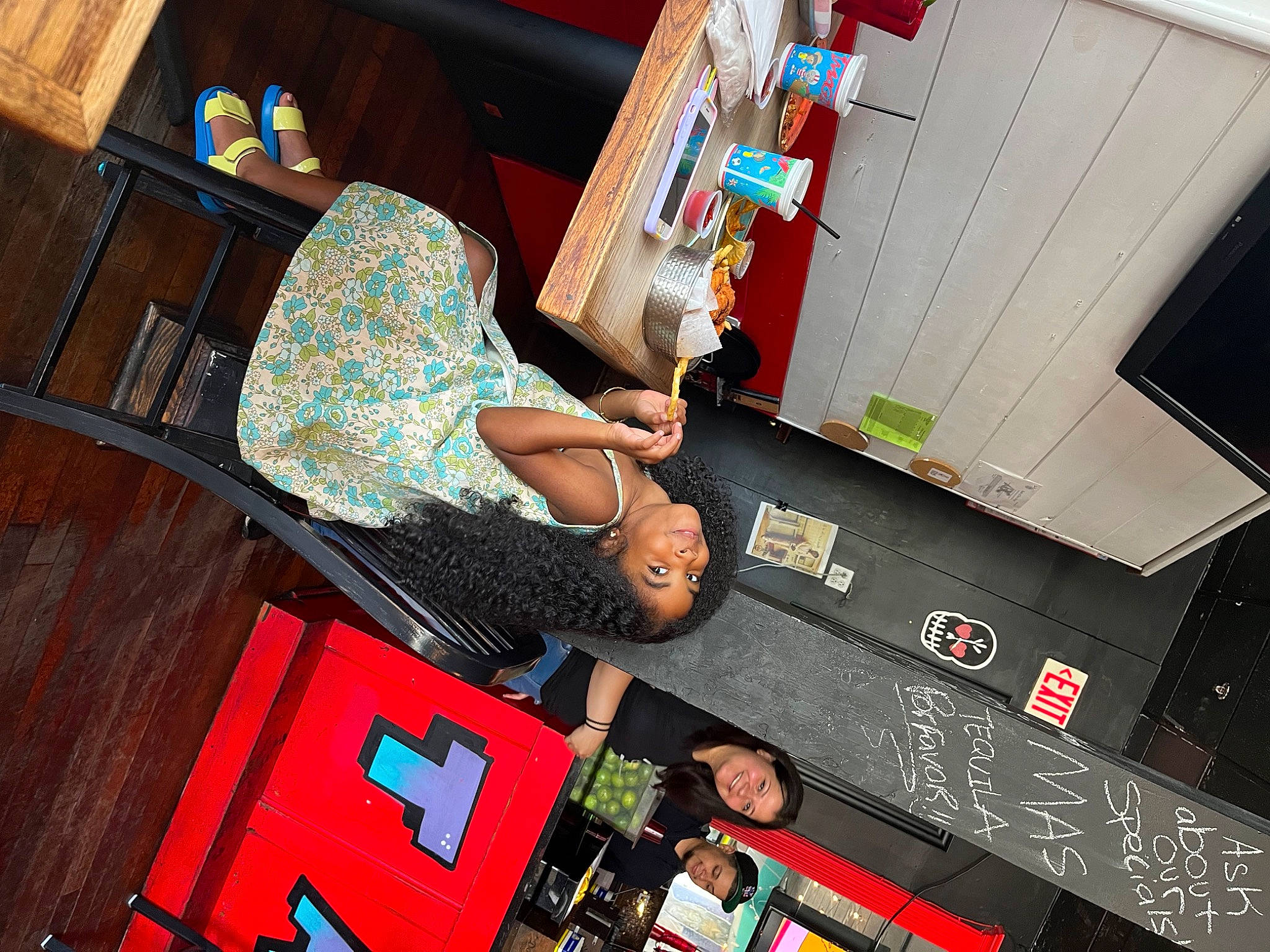 Myrical is registered to the contest to win money with this photo: art, comfort, flooring, fun, hardwood, headwear, human_leg, joy, leisure, machine, person, play, recreation, room, shelf, snapshot, thigh, visual_arts, wood