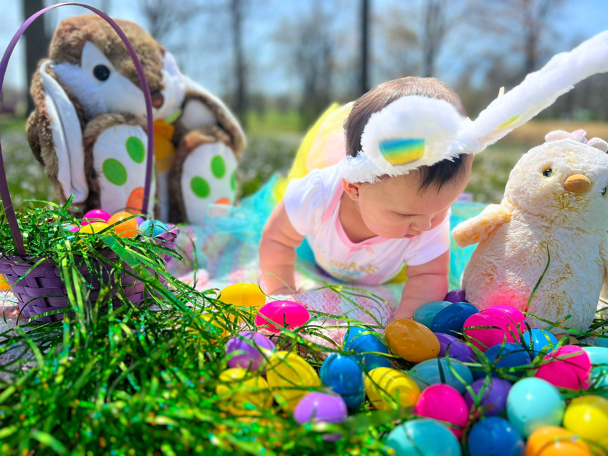 Antonella is registered to the contest to win money with this photo: baby, child, easter, event, fawn, fun, grass, green, happy, leisure, people, people_in_nature, person, photograph, recreation, snapshot, spring, stuffed_toy, toddler, toy