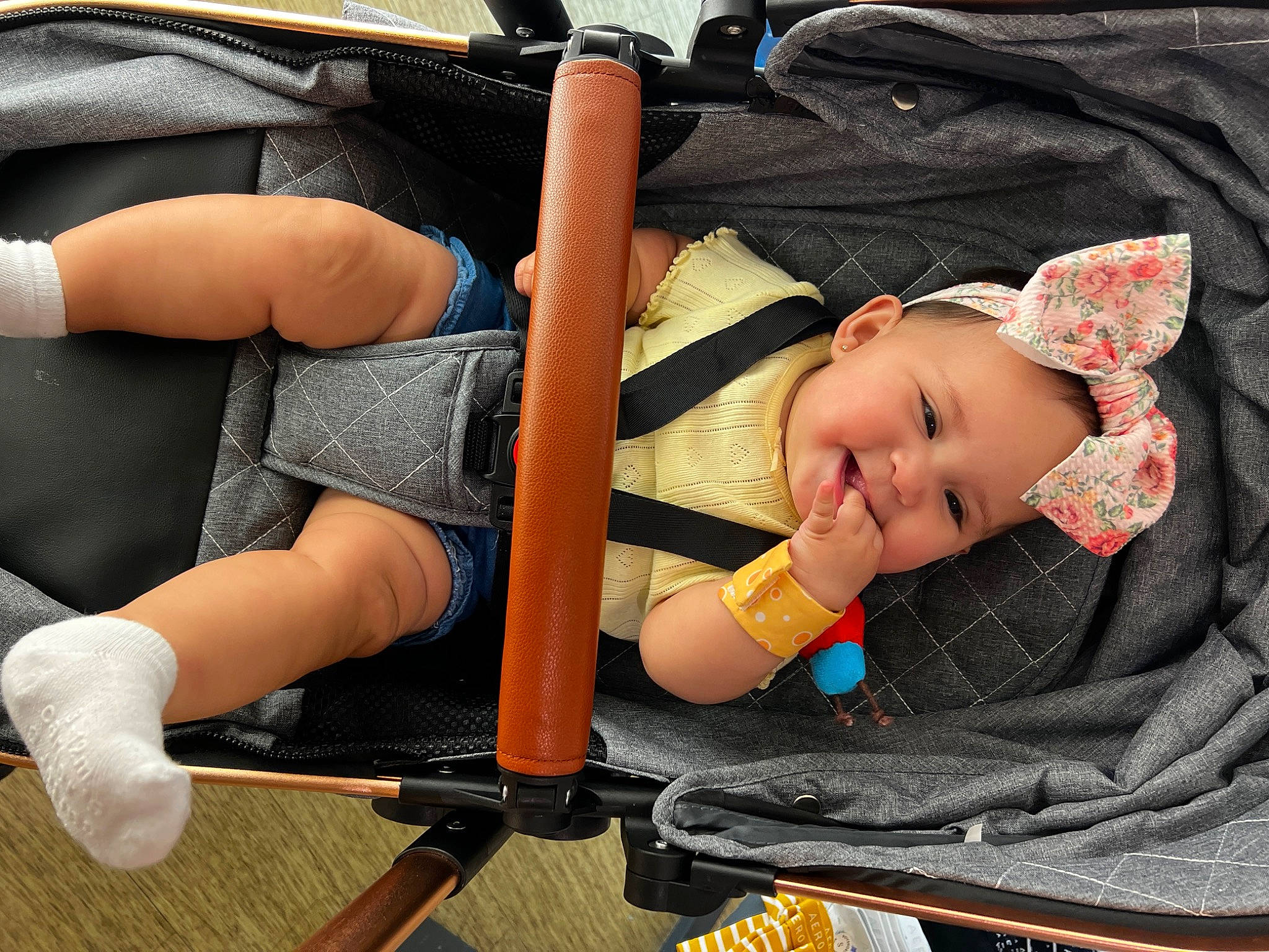 Antonella joined the competition — help win amazing prizes! baby, baby_carriage, baby_products, baby_safety, baby_toddler_clothing, car_seat, child, comfort, elbow, headwear, human_leg, knee, lap, person, product, shorts, sitting, skin, thigh, tire