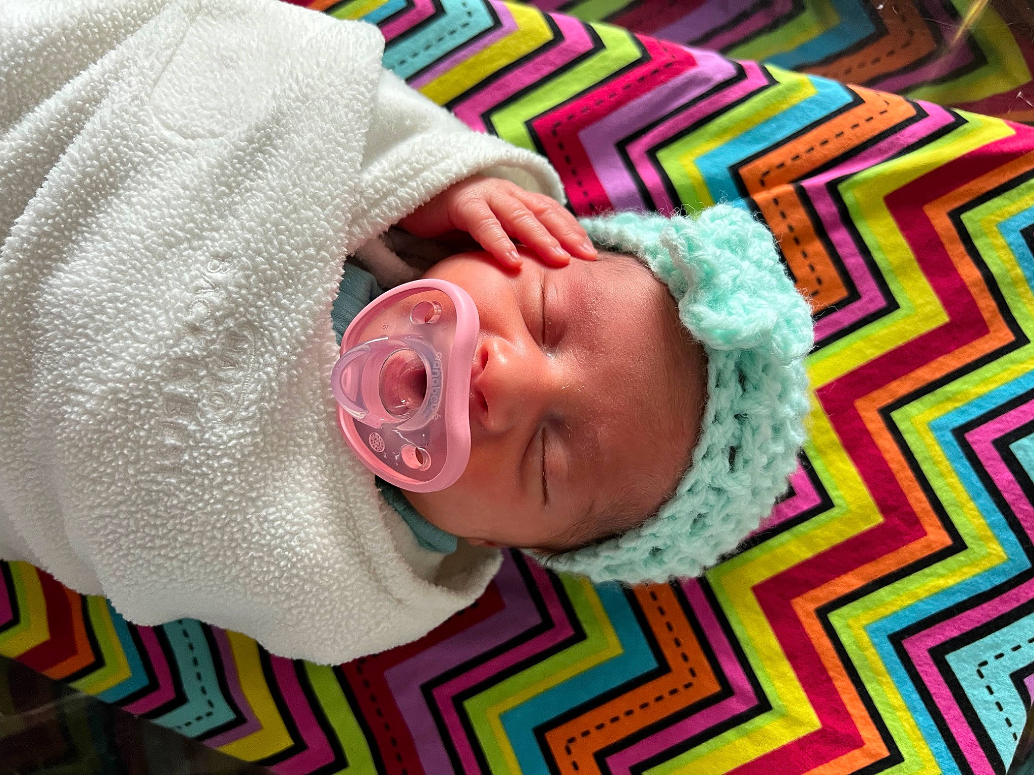 Antonella joined the competition — help win amazing prizes! baby, baby_products, baby_sleeping, baby_toddler_clothing, cheek, child, comfort, eye, face, fashion_accessory, head, linens, magenta, nose, pattern, person, pink, skin, sleeve, textile