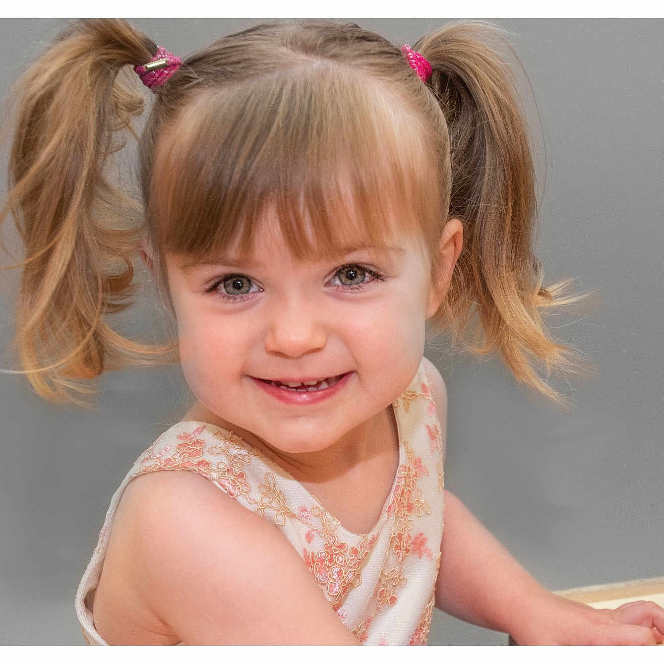 Phoebe joined the competition — help win amazing prizes! bodypart, child, clothing, dress, face, female, finger, girl, hair, hand, happy, head, mouth, person, photography, ponytail, portrait, smile, teeth, wood