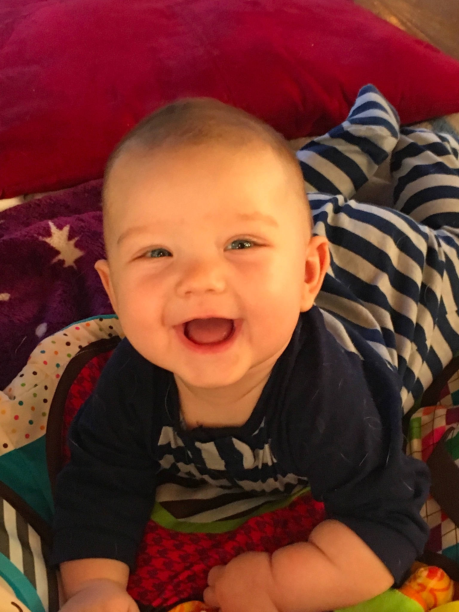 Oden is registered to the contest to win money with this photo: baby, baby_toddler_clothing, cheek, chin, comfort, eye, finger, happy, head, human_body, iris, joy, lip, mouth, nose, orange, organ, person, skin, sleeve