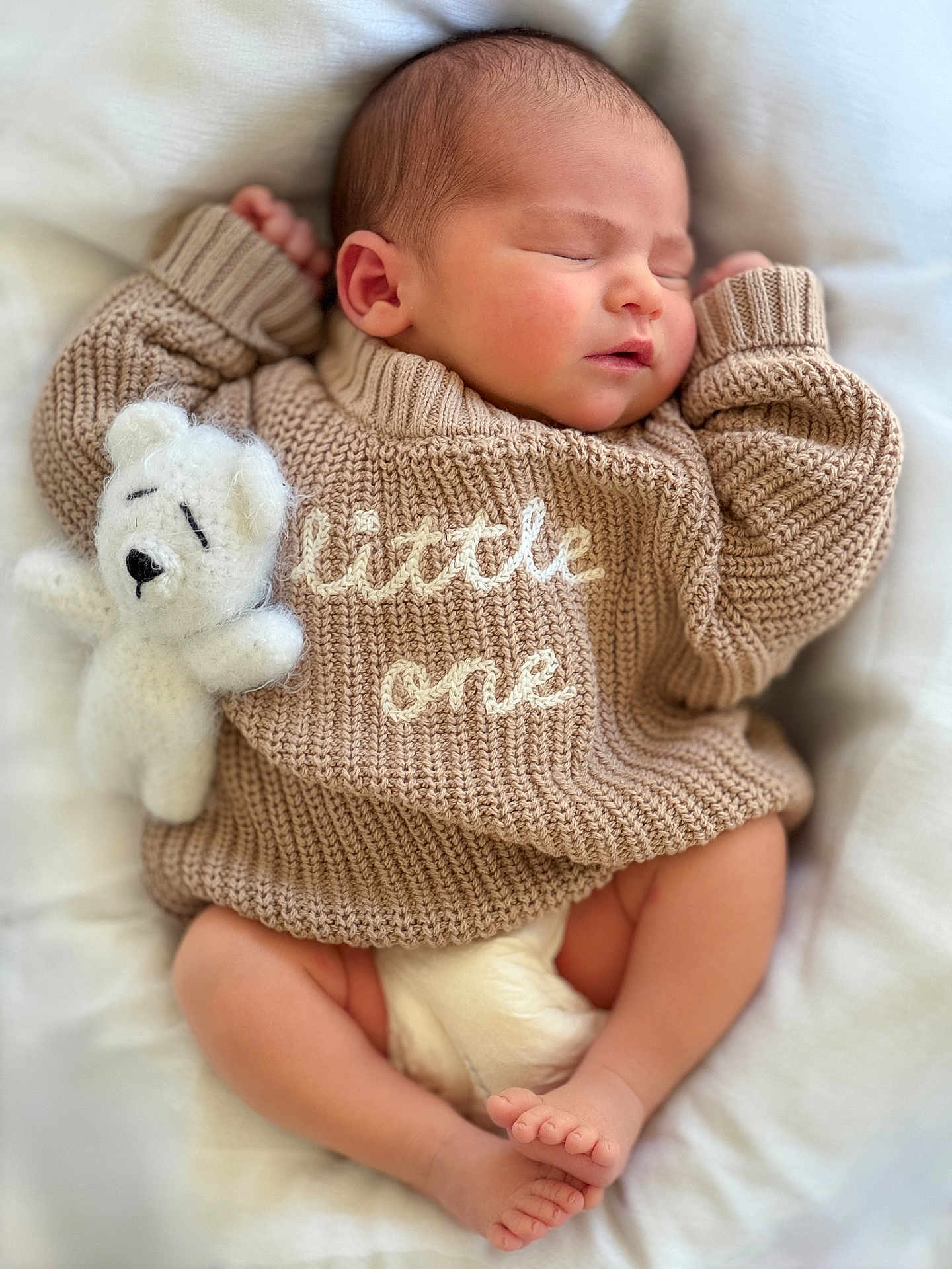 Koray is registered to the contest to win money with this photo: newborn, baby, sleeping, knitted_sweater, teddy_bear, soft_blanket, infant, cute, peaceful, cozy, child, portrait, closeup, tiny_feet, relaxing, indoors, cuddly, warm, adorable, resting