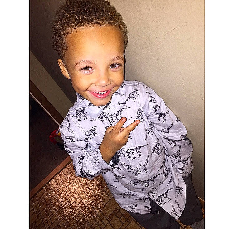 Jay Jay is registered to the contest to win money with this photo: baby, beauty, cheek, child, child_model, cool, design, face, forehead, hair, hairstyle, head, human, joy, lip, nose, outerwear, person, smile, t_shirt