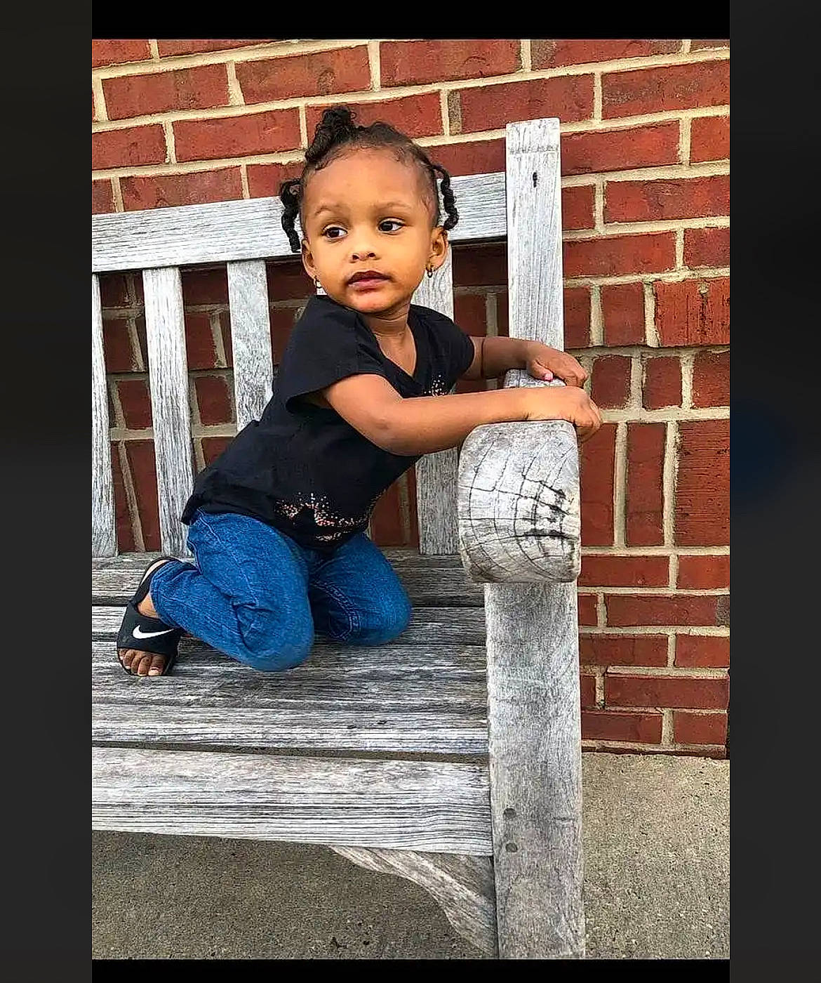 Jamylah joined the competition — help win amazing prizes! baby, baby_toddler_clothing, brick, brickwork, child, denim, electric_blue, flash_photography, font, happy, magenta, pattern, person, rectangle, room, sitting, sleeve, t_shirt, toddler, window