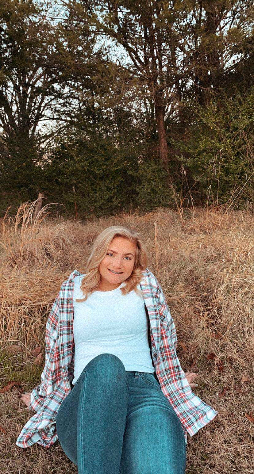 Kinzie joined the competition — help win amazing prizes! beauty, brown_hair, comfort, denim, fawn, grass_family, jeans, joy, knee, long_hair, mammal, people_in_nature, person, photo_shoot, plaid, portrait, portrait_photography, sitting, street_fashion, sweater