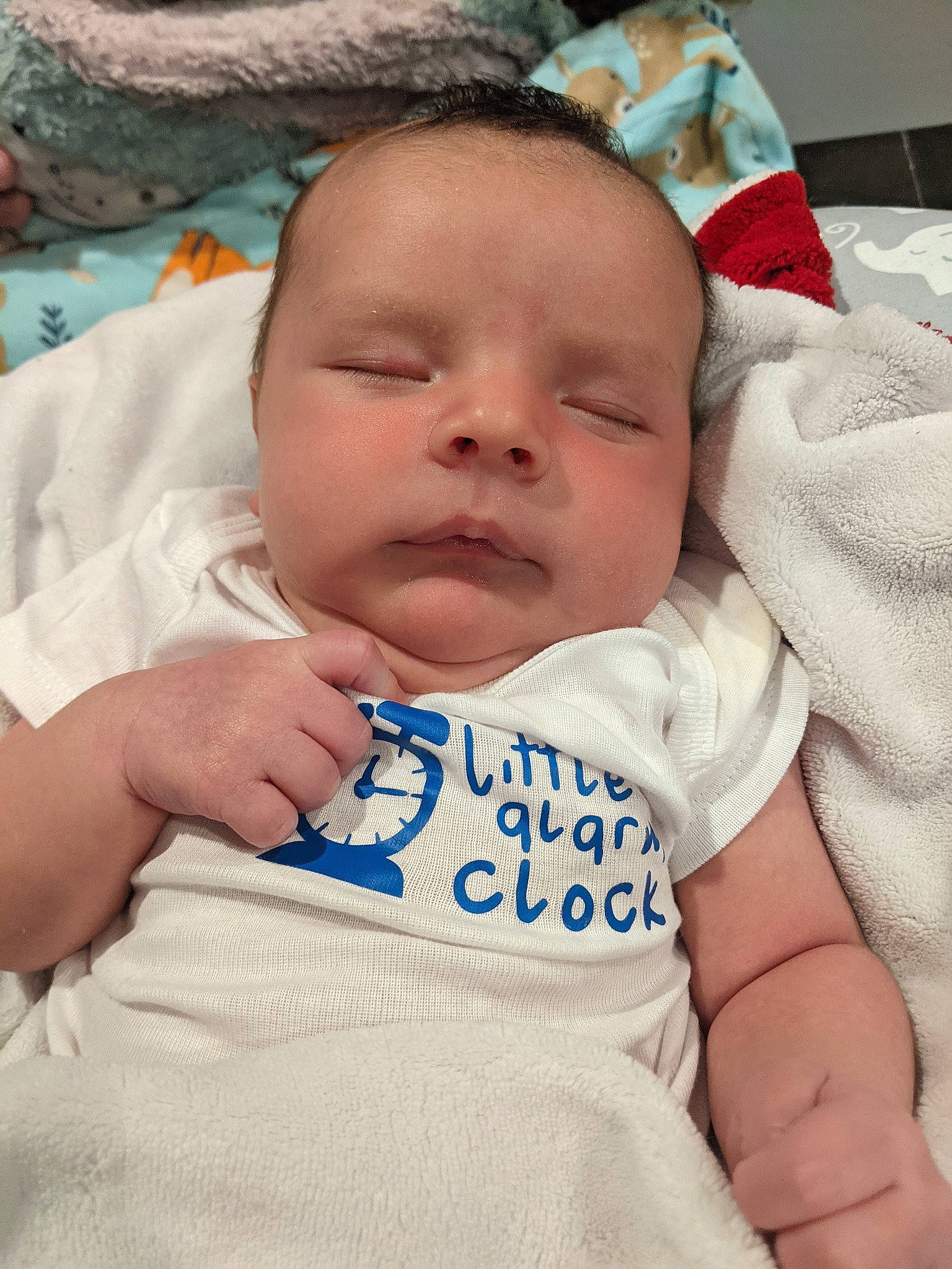 Carlos Jr is registered to the contest to win money with this photo: baby, baby_sleeping, baby_toddler_clothing, cheek, child, chin, comfort, eye, eyebrow, face, finger, head, iris, linens, lip, mouth, nose, person, skin, textile