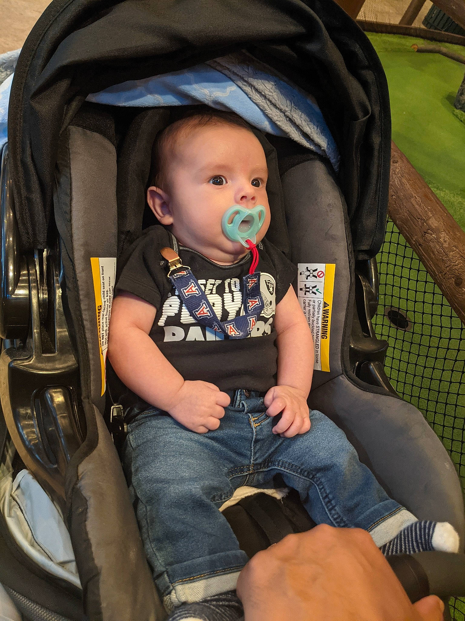 Carlos Jr is registered to the contest to win money with this photo: baby, baby_carriage, baby_products, baby_toddler_clothing, black, car_seat, chair, cheek, child, comfort, cool, fashion_accessory, fun, lap, person, product, sitting, skin, thigh, toddler