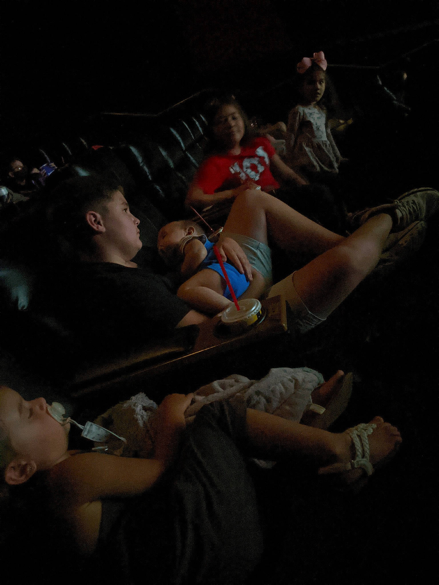 Preston is registered to the contest to win money with this photo: boot, chest, comfort, crowd, darkness, elbow, entertainment, event, eyewear, flash_photography, foot, fun, hat, human_leg, knee, midnight, performing_arts, person, shorts, thigh