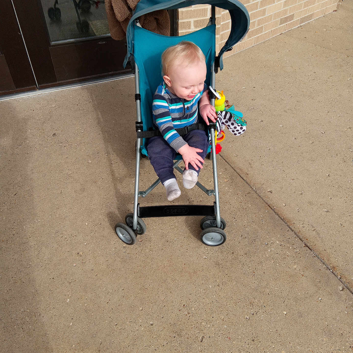 Calvin is registered to the contest to win money with this photo: accessories, alloywheel, baby, bed, brick, buggy, candy, car, carwheel, city, clothing, cream, dessert, door, face, food, footwear, furniture, hat, head