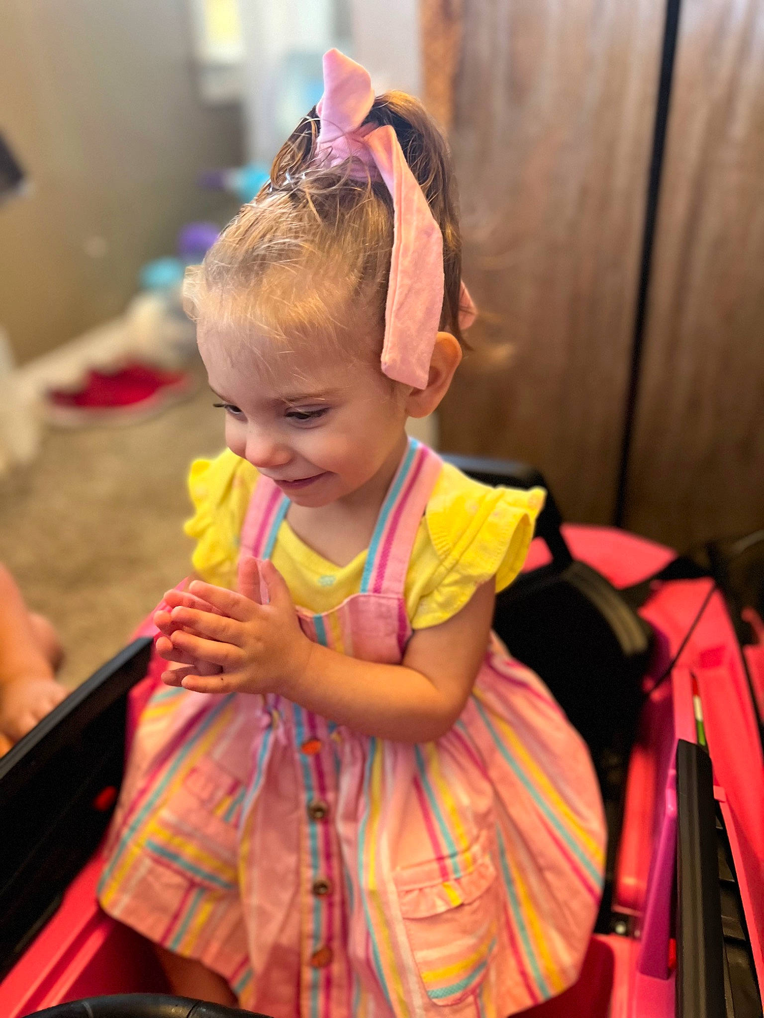 Kaykay is registered to the contest to win money with this photo: baby, baby_toddler_clothing, beauty, child, event, fun, happy, headband, leisure, luggage_and_bags, magenta, motor_vehicle, person, pink, recreation, sitting, skin, smile, summer, toddler