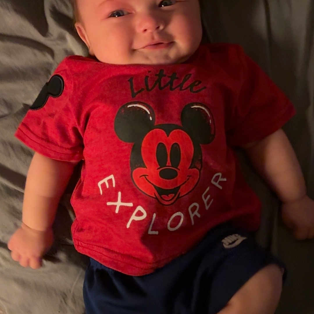 Stetson is registered to the contest to win money with this photo: baby, bodypart, clothing, couch, cushion, face, finger, furniture, hand, head, homedecor, indoors, newborn, pants, person, photography, portrait, shirt, shorts, t_shirt