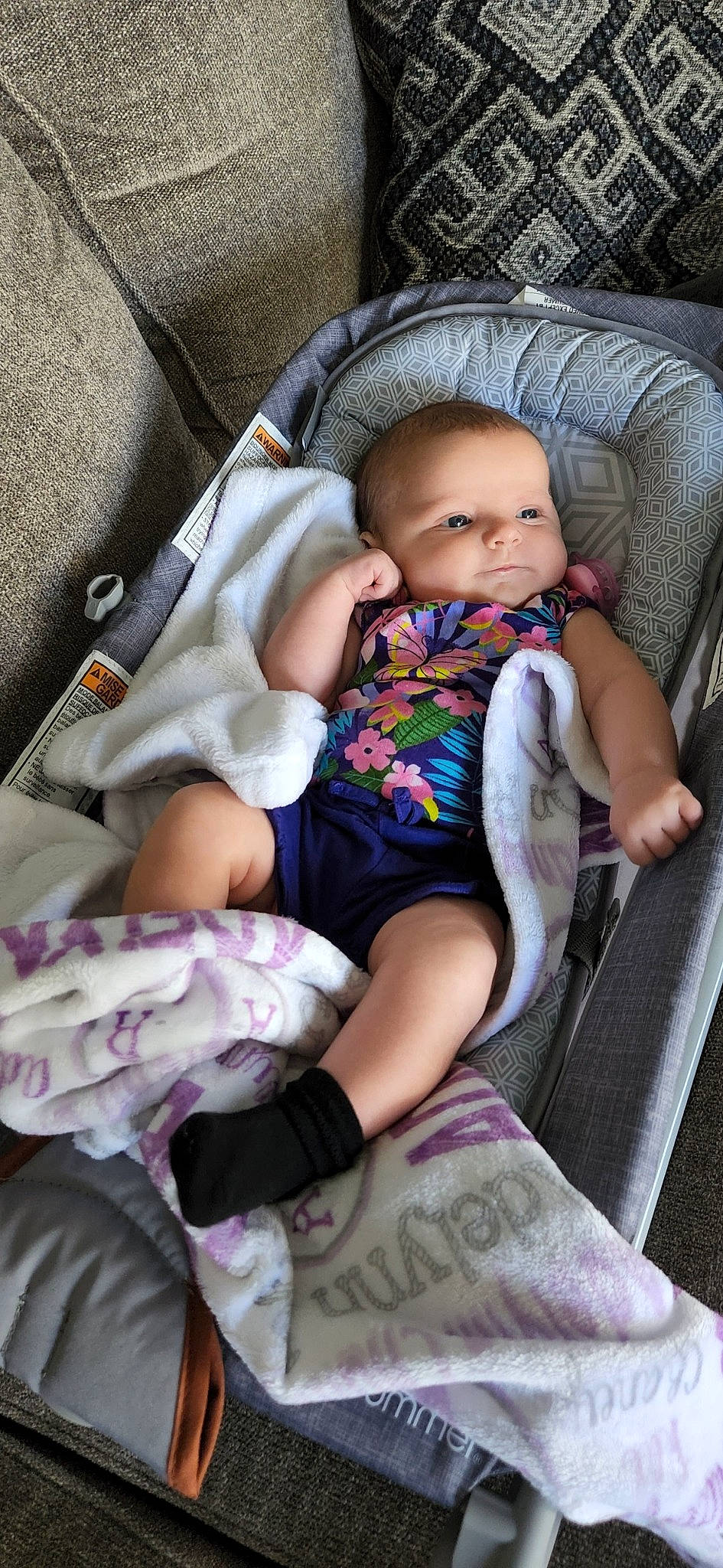 Adelynn is registered to the contest to win money with this photo: baby, baby_in_car_seat, baby_toddler_clothing, car_seat, chair, cheek, child, comfort, eye, face, finger, head, lap, mouth, product, purple, seat_belt, skin, thigh, toddler
