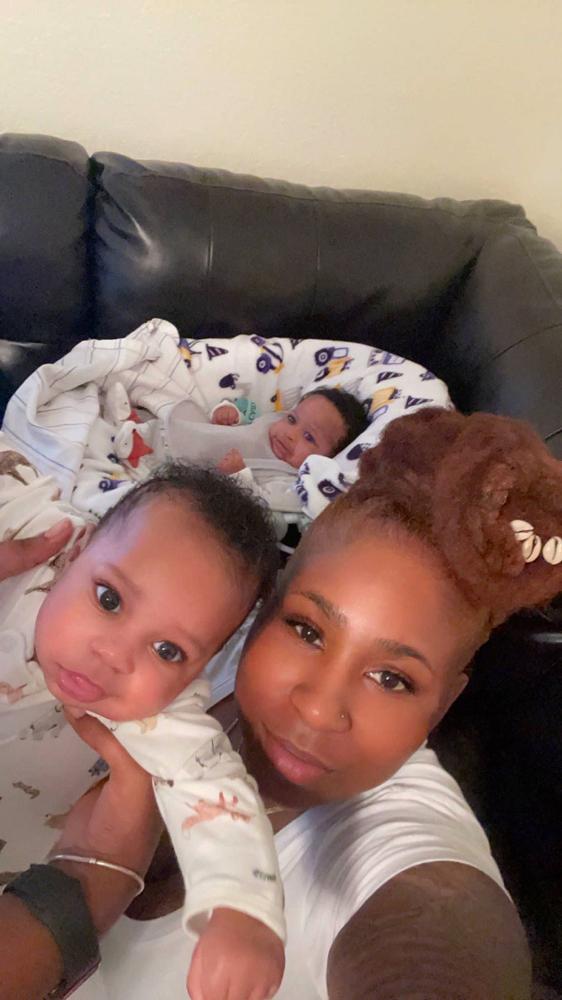 Aiden is registered to the contest to win money with this photo: baby, baby_toddler_clothing, cheek, child, comfort, couch, eyebrow, eyelash, flooring, fun, happy, nose, person, room, sitting, skin, toddler, white