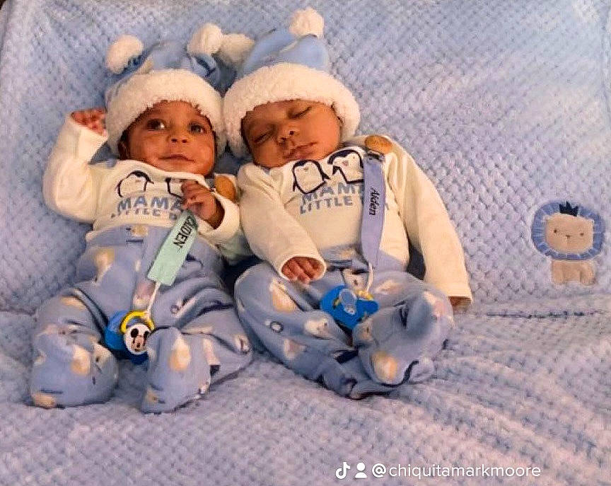 Aiden And Caiden is registered to the contest to win money with this photo: baby, baby_products, baby_sleeping, baby_toddler_clothing, beanie, cap, carmine, cheek, child, comfort, happy, headwear, knit_cap, linens, pattern, person, room, thumb, toddler, toy