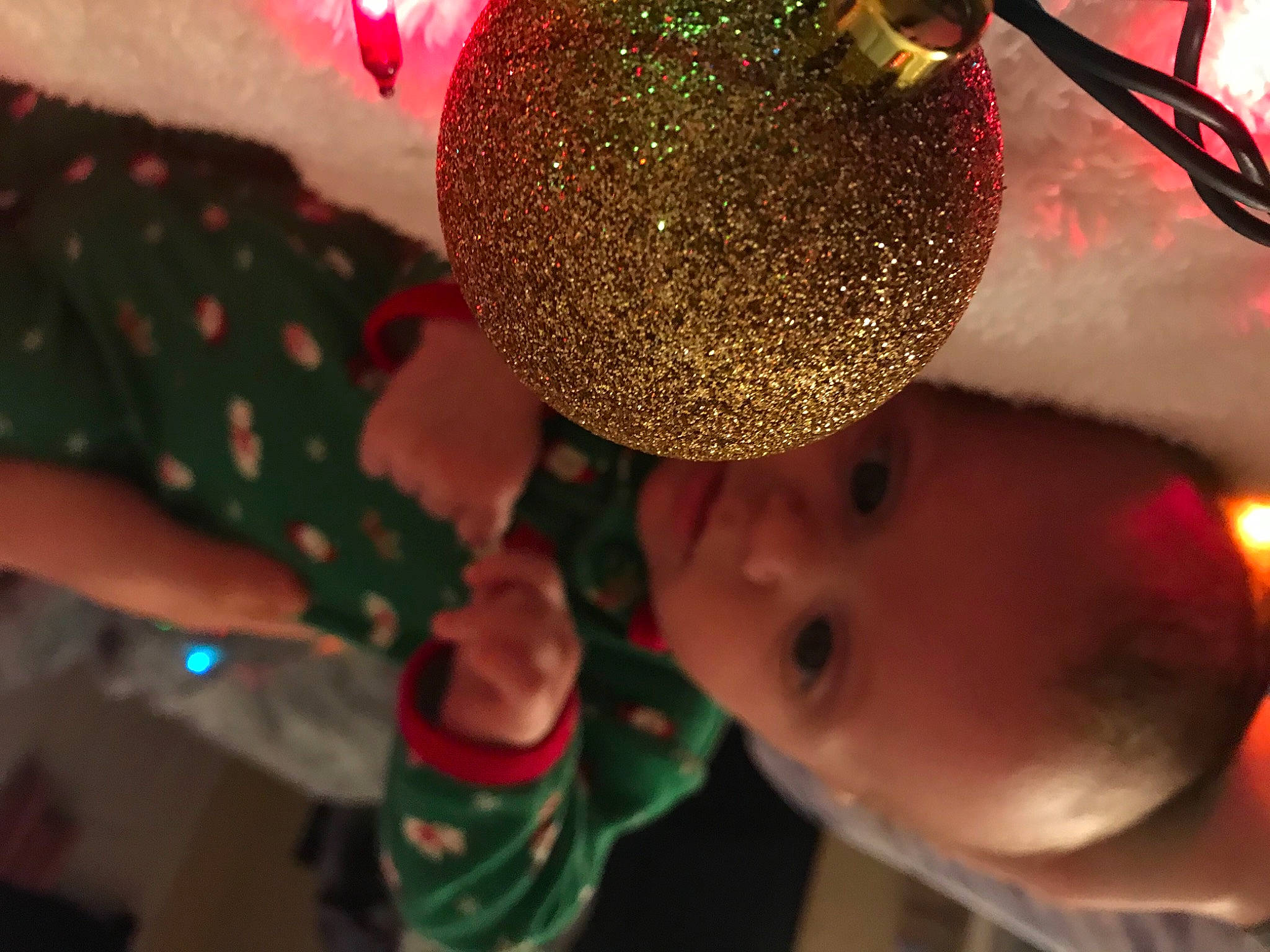 Braylin joined the competition — help win amazing prizes! child, christmas, christmas_decoration, christmas_eve, christmas_ornament, event, fashion_accessory, finger, fun, green, hair, happy, holiday, holiday_ornament, light, ornament, party_supply, person, red, toddler