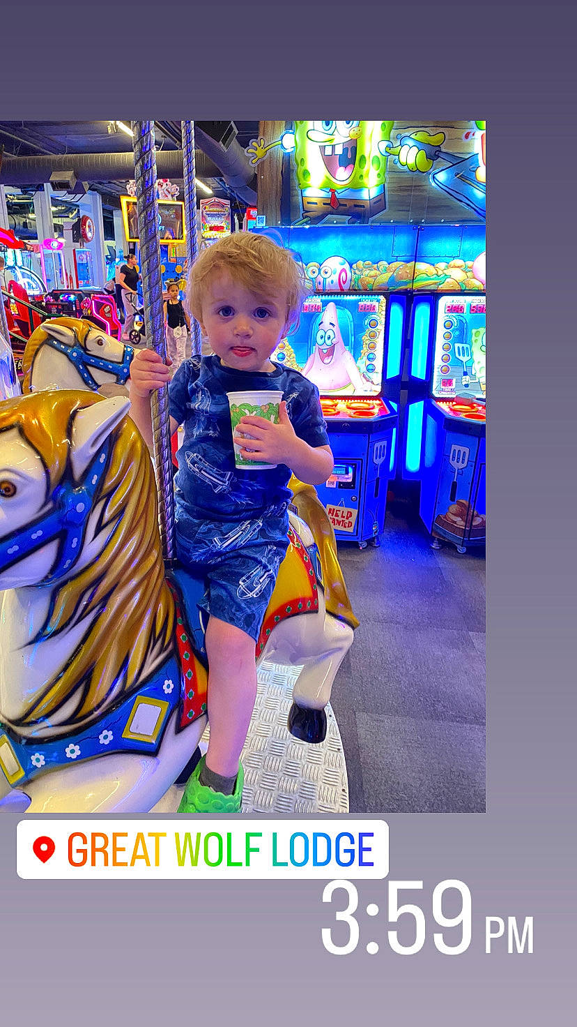 Bray Bray is registered to the contest to win money with this photo: advertising, amusement_ride, baby, child, electric_blue, fictional_character, flooring, font, fun, happy, leisure, person, photo_caption, play, recreation, room, sandal, toddler, travel