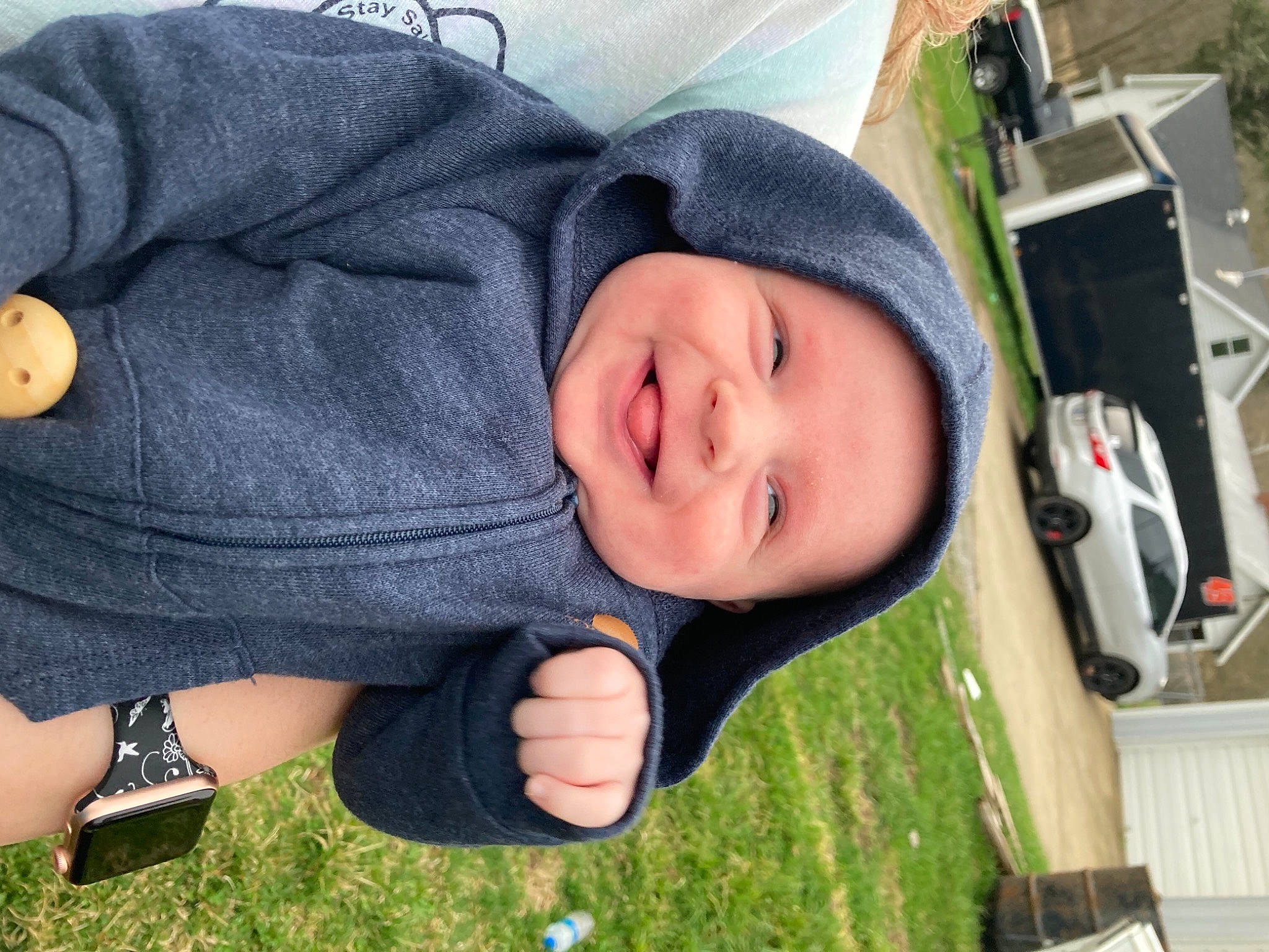 Haiden is registered to the contest to win money with this photo: baby, baby_products, baby_toddler_clothing, cheek, child, eye, finger, fun, grass, happy, hat, headwear, human_body, joy, leisure, nose, person, plant, sitting, smile