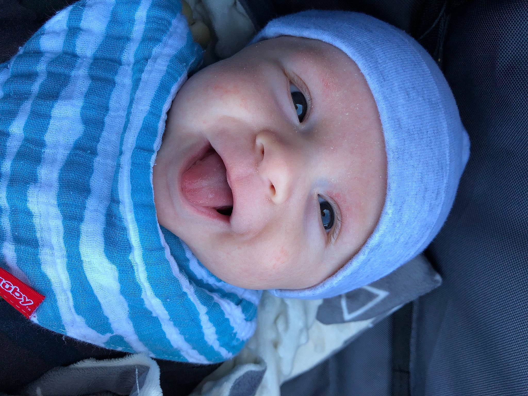 Haiden is registered to the contest to win money with this photo: azure, baby, baby_toddler_clothing, cheek, child, chin, close_up, electric_blue, eyebrow, happy, hat, headwear, iris, lip, nose, outerwear, person, product, skin, sleeve