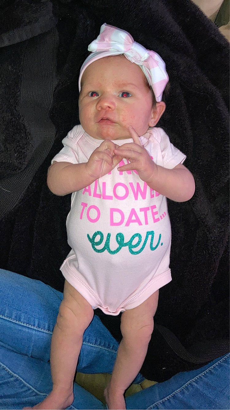 Oakley joined the competition — help win amazing prizes! baby, baby_products, baby_toddler_clothing, cheek, child, eye, face, fashion_accessory, happy, hat, headwear, human_leg, pattern, person, pink, sitting, skin, sleeve, t_shirt, thigh