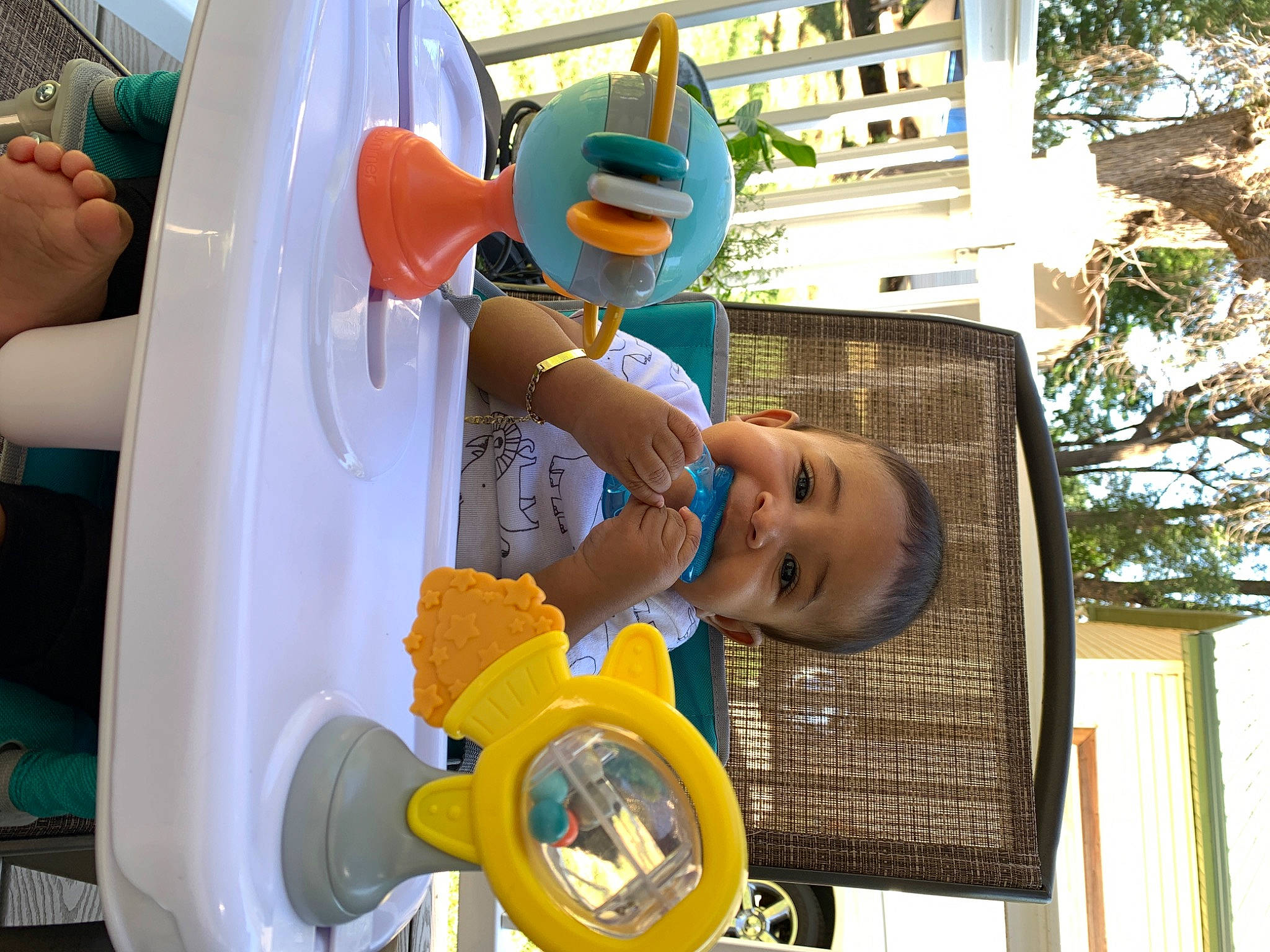 Romeo is registered to the contest to win money with this photo: child, city, engineering, event, fun, happy, hat, leisure, machine, person, plastic, product, recreation, smile, t_shirt, tree, vacation, wheel, window, yellow