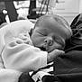 baby, black_and_white, blanket, closeup, clothing, cozy, cute, face, hand, indoors, infant, monochrome, newborn, peaceful, person, portrait, resting, sleeping, soft, toddler